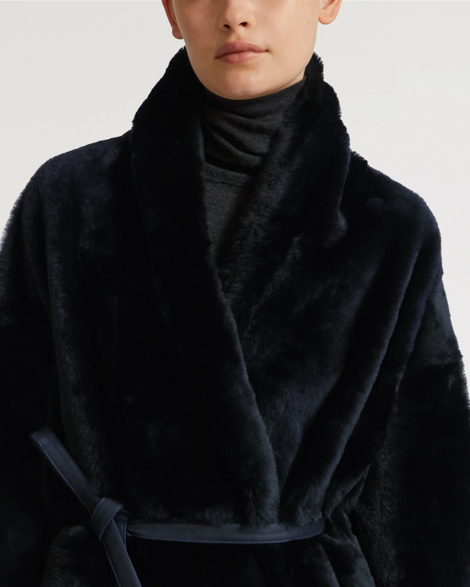 Long belted shearling coat